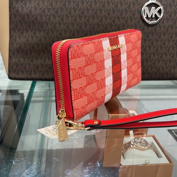 MICHAEL KORS Leather Continental Phone Holder Wristlet Wallet 
Dark Sungria
NWT - Picture 16 of 16